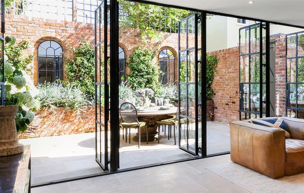 Indoor outdoor tiles in a small urban courtyard